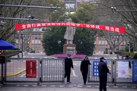 Security guards standing in front of an entrance to Tongji University in Shanghai on March 12. PHOTO: ALY SONG/REUTERS