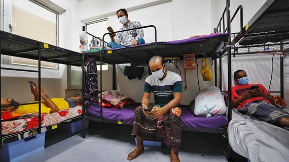 Singapore has about 1.4 million foreign workers, many of whom live with thousands of others in cramped dormitories that offer little personal space. (Courtesy of Singapore's Ministry of Manpower)
