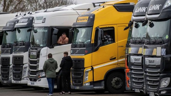 Lorry drivers at the Ashford International Truck Stop in Kent on Tuesday. Thousands of trucks are stuck on the English side of the Channel © Chris J Ratcliffe/Getty