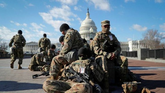 National Guard troops gather in front of the US Capitol ahead of president-elect Joe Biden’s Inauguration in Washington © Mike Segar/Reuters