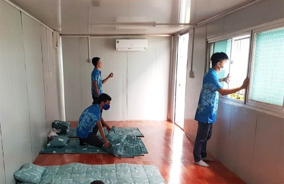 The Ocean Coatings (Vietnam) Company Limited, located in the Long Thành Industrial Zone, has set up six container offices to offer temporary accommodations for its workers. File photo from vnexpress.vn