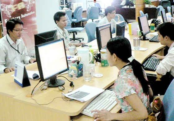 Chuyên viên phần mềm Việt Nam làm việc tại Công ty Global CyberSoft trong  Công viên Phần mềm Quang Trung. Ảnh: T.Ba