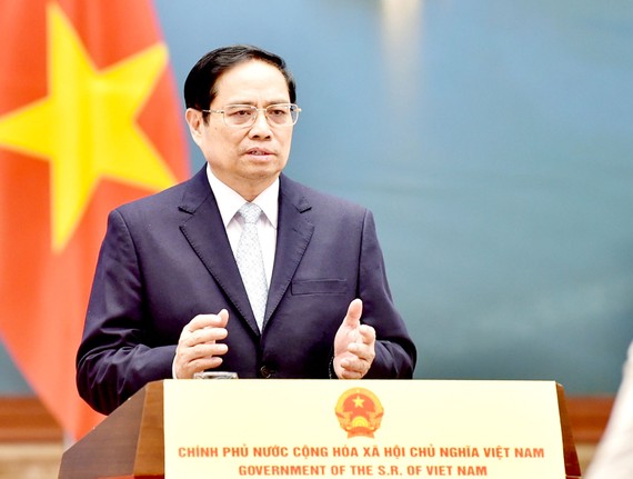 Thủ tướng Phạm Minh Chính phát biểu tại Diễn đàn “Tuần lễ Năng lượng Nga” lần thứ IV. Ảnh: TTXVN