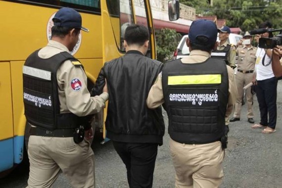 A suspect of the telecoms scam detained by Cambodian police (Source: wtop.com)