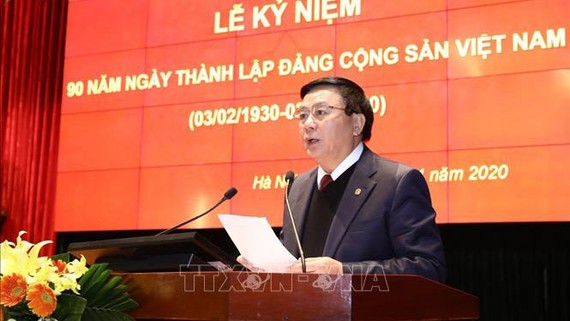 Giám đốc Học viện Chính trị quốc gia Hồ Chí Minh đọc diễn văn tại Lễ mít tinh. Ảnh: Văn Điệp/TTXVN