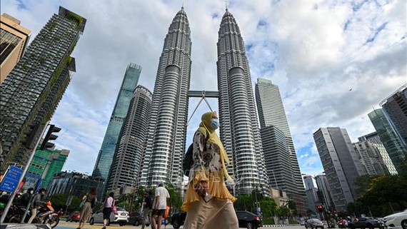 Người dân tại Kuala Lumpur, Malaysia. Ảnh: TTXVN