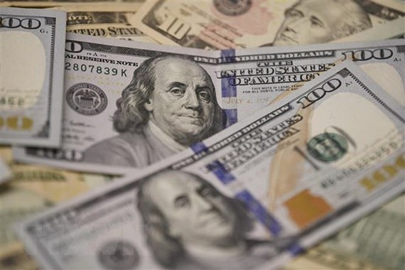 Đồng USD tại một ngân hàng ở Washington, DC, Mỹ. (Nguồn: THX/TTXVN)