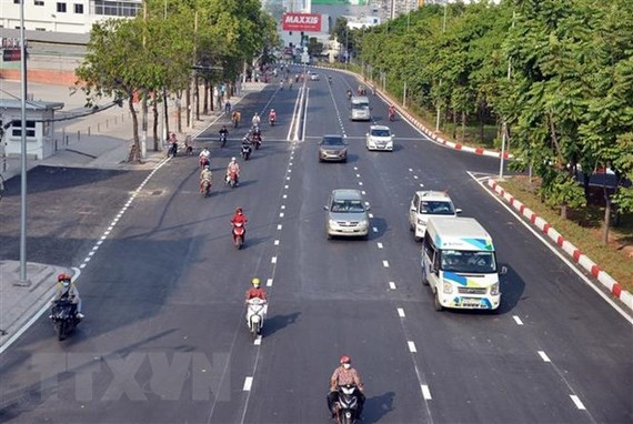 Đường Nguyễn Hữu Cảnh được nâng cấp, có khả năng giải quyết điểm ngập hơn 10 năm qua của Thành phố. (Ảnh: Tiến Lực/TTXVN)