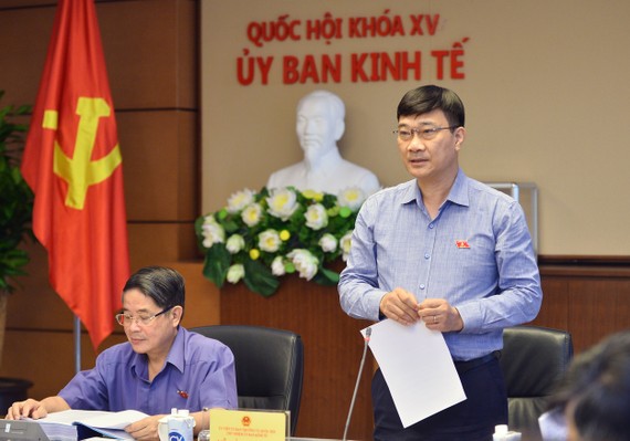 Chủ nhiệm Ủy ban Kinh tế Vũ Hồng Thanh phát biểu khai mạc phiên họp  ​
