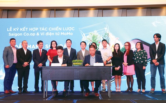 Lãnh đạo Saigon Co.op và Ví MoMo ký kết hợp tác chiến lược thúc đẩy thanh toán không dùng tiền mặt 
