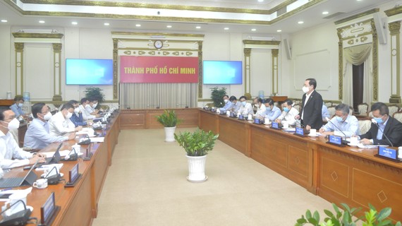 Bộ trưởng Bộ KH-CN Huỳnh Thành Đạt làm việc với lãnh đạo UBND TPHCM. Ảnh: CAO THĂNG