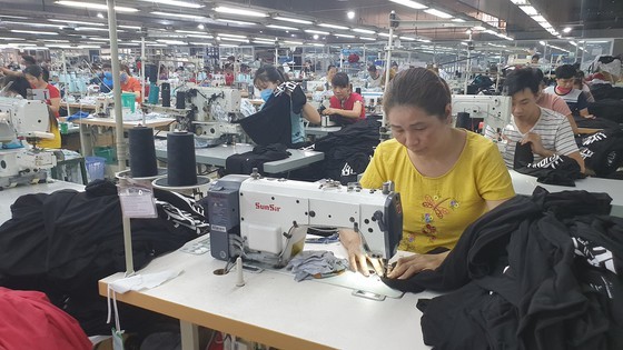 Garment, textile enterprises long for solutions to solve difficulties