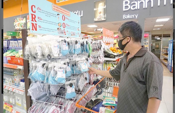 Antimicrobial face masks are sold at an outlet of Saigon Co.op. (Photo: SGGP)