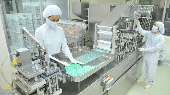 Manufacturing products for domestic consumption and export at Agimexpharm. (Photo: SGGP)