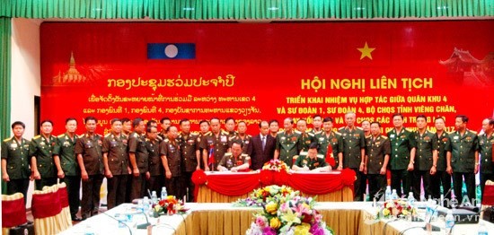 Delegates at the conference on cooperation between Military Zone 4 High Command and Laos’s military ​units in Nghe An province (Source: baonghean.vn)