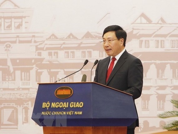 Deputy Prime Minister and Minister of Foreign Affairs Pham Binh Minh opens the 30th Diplomatic Conference (Photo: VNA)
