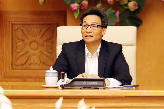 Deputy Prime Minister Vu Duc Dam, head of the National Steering Committee for Prevention and Control of the Acute Respiratory Disease Caused by a New Coronavirus (nCoV) in the meeting