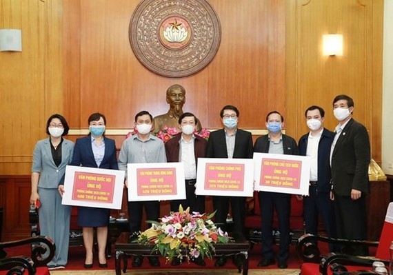 The VFF central Committee receives funds from the Party Central Committee Office,  the Government Office, the National Assembly Office, and the President Office (Photo: dangcongsan.vn)