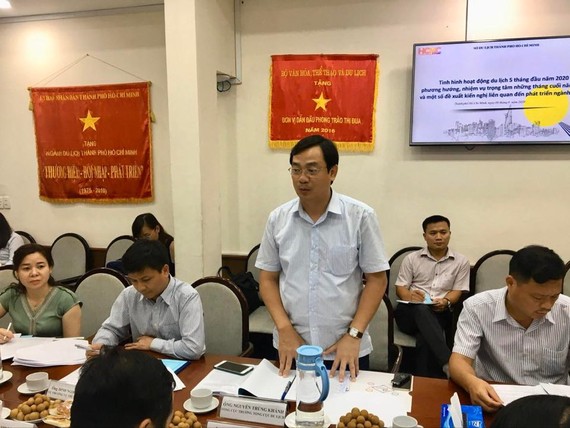Chairman of Vietnam National Administration of Tourism Nguyen Trung Khanh speaks at the meeting. (Photo: SGGP)