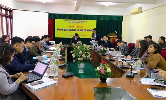 Delegates discuss problems and solutions to ensure better rights for Vietnamese guest workers abroad at a conference held on January 15 (Photo: VNA) 