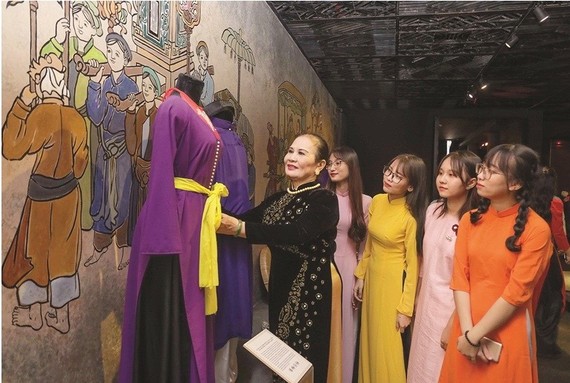 Young people visit Ao Dai Museum in  HCMC. (Photo: SGGP)