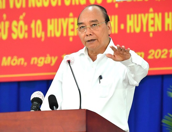 State President Nguyen Xuan Phuc speaks at the conference. (Photo: SGGP)