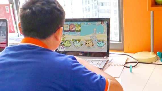 Cảnh báo game blockchain Giao diện của dòng Game Axie Infinity. Ảnh: HOÀNG HÙNG