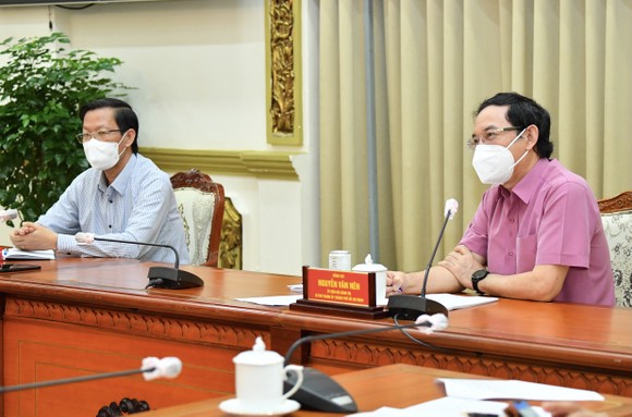 Lãnh đạo TPHCM gặp gỡ chuyên gia, nghe góp ý về phòng chống dịch và phục hồi kinh tế ảnh 1
