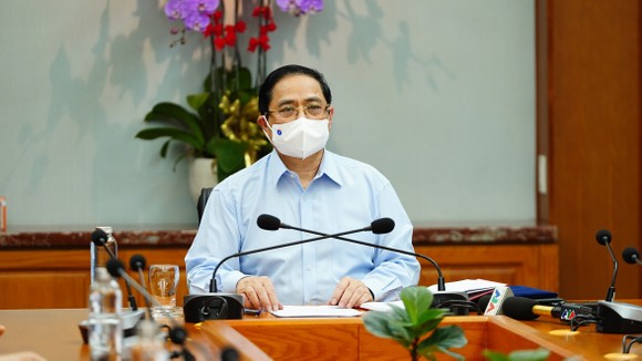 Thủ tướng Chính phủ Phạm Minh Chính: Không vì phát triển kinh tế mà hy sinh sức khỏe của nhân dân ảnh 2