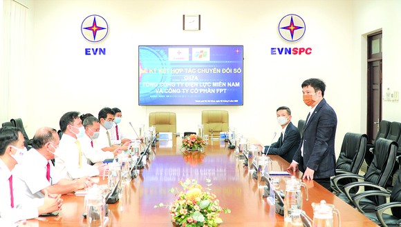 EVNSPC hợp tác với FPT để số hóa hoạt động sản xuất kinh doanh ảnh 1