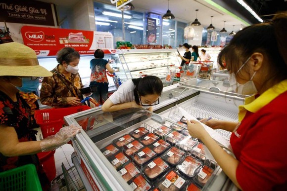 TPHCM và Hà Nội không cần lo thiếu thịt heo ảnh 1