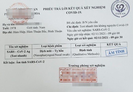 Khởi tố 2 đối tượng làm giả giấy xét nghiệm Covid-19 để bán ảnh 1