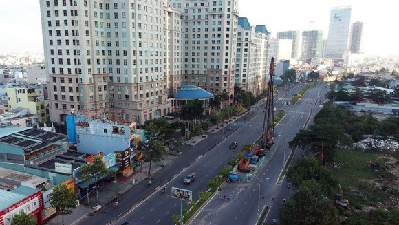 Đẩy nhanh tiến độ thi công đường Nguyễn Hữu Cảnh ảnh 1