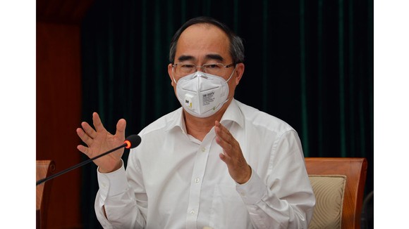 Bí thư Thành ủy TPHCM Nguyễn Thiện Nhân: Bớt thu nhập của cán bộ để hỗ trợ công nhân mất việc ảnh 3