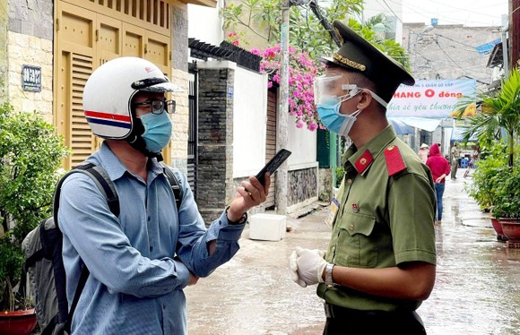 Phóng viên tác nghiệp về Covid-19 phải tuyệt đối chấp hành quy định phòng dịch ảnh 1