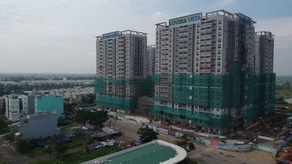 Tiền vẫn đổ vào bất động sản ảnh 1