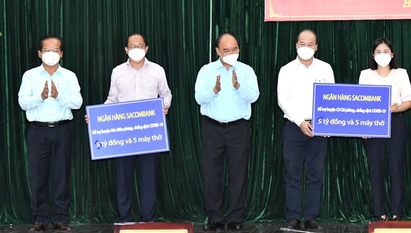 Chủ tịch nước Nguyễn Xuân Phúc đồng ý chủ trương giãn cách tại TPHCM thêm một thời gian nữa ảnh 4