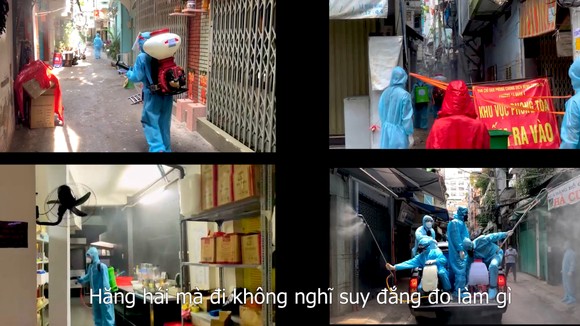 Đội khử khuẩn di động phản ứng nhanh thực hiện ca khúc "Giận Cô vi” cổ vũ tinh thần chống dịch ảnh 1