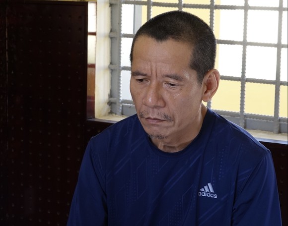 Con tâm thần chém chết cha ruột ảnh 1
