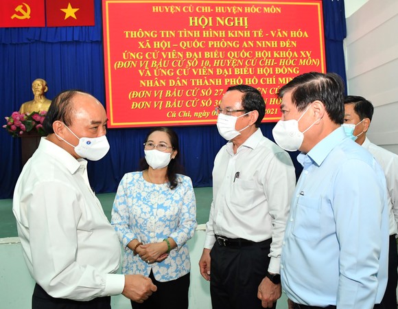 Chủ tịch nước Nguyễn Xuân Phúc quan tâm thúc đẩy hai huyện Hóc Môn và Củ Chi phát triển ảnh 1