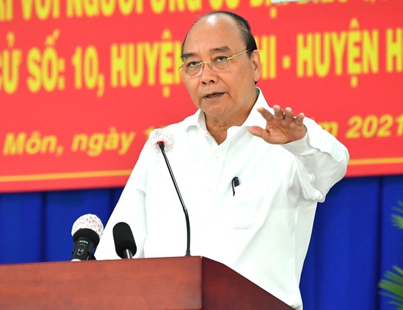 Chủ tịch nước Nguyễn Xuân Phúc: đưa huyện Hóc Môn, Củ Chi trở thành thành phố phía Tây, cực tăng trưởng mới của TPHCM ảnh 1