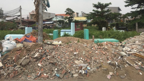 Chậm di dời nghĩa địa khỏi khu dân cư ảnh 1