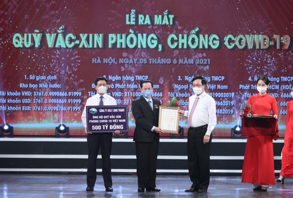 Ông Lê Văn Kiểm Chủ tịch Golf Long Thành ủng hộ 500 tỷ đồng vào Quỹ vaccine phòng chống dịch Covid-19 ảnh 1