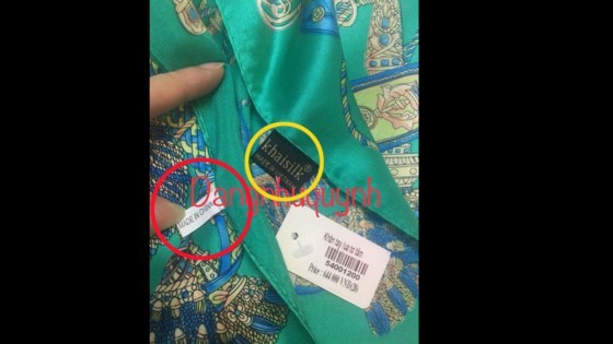 Trên một chiếc khăn của Khaisilk vừa có nhãn "Khaisilk - Made in Viet Nam" vừa có nhãn "made in China"
