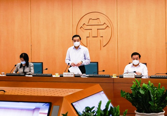 Chủ tịch UBND TP Hà Nội: Tuyệt đối không để lây nhiễm dịch ở các tổ bầu cử ảnh 1