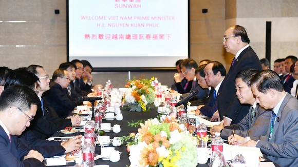 Thủ tướng Nguyễn Xuân Phúc hội kiến Chủ tịch Trung Quốc Tập Cận Bình ảnh 1