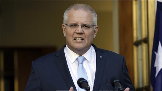 Thủ tướng Australia Scott Morrison phát biểu tại cuộc họp báo ở Canberra. Ảnh: TTXVN