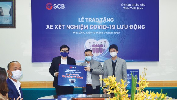 SCB tiếp tục chuỗi hoạt động trao tặng xe xét nghiệm lưu động tại Thái Bình và Thanh Hóa ảnh 1