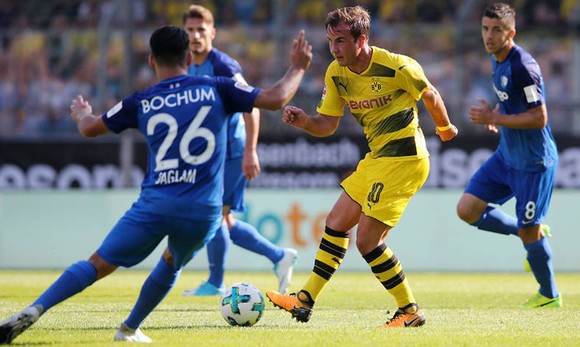 Mario Goetze (giữa), cầu thủ duy nhất thể hiện được tính sáng tạo trong đội hình của Dortmund .