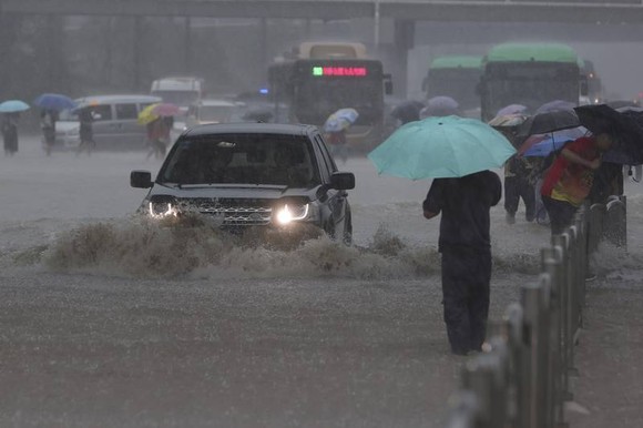 Trung Quốc nâng cảnh báo lũ lụt lên gần mức cao nhất ảnh 3